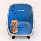 handmade ceramic pet figurine phone stand close up desk accessory