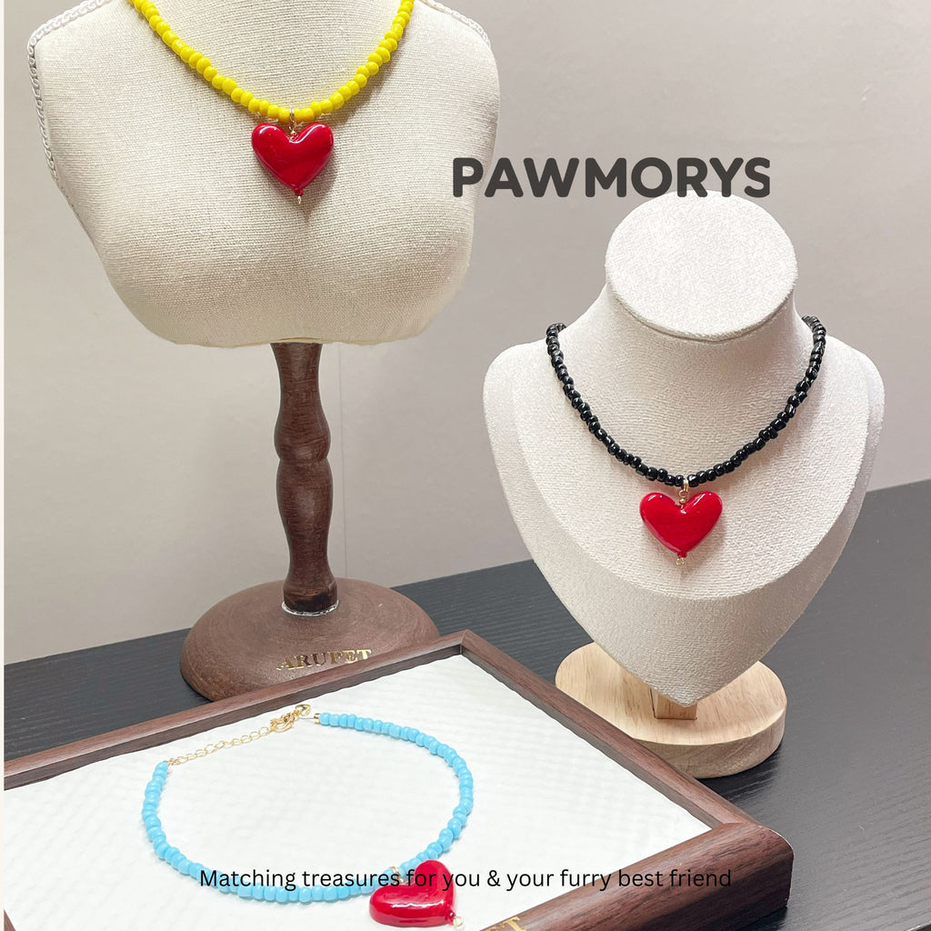 American Sweetheart matching heart necklaces in yellow, black and sky blue