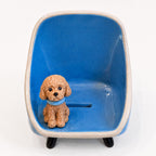 handmade ceramic pet figurine phone stand close up desk accessory