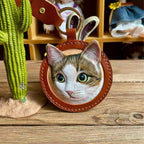 handmade leather pet portrait keychain close up engraving detail