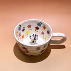 Close up handmade ceramic dog figurine on custom 3D pet mug
