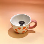 Close up handmade ceramic dog figurine on custom 3D pet mug