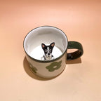 Close up handmade ceramic dog figurine on custom 3D pet mug