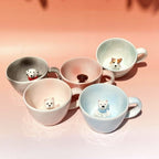 Close up handmade ceramic dog figurine on custom 3D pet mug